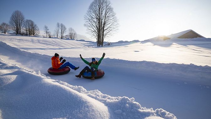 hd-kaiserwinkl-urlaub-aktivitaeten-snowtubing-koessen-winter-1